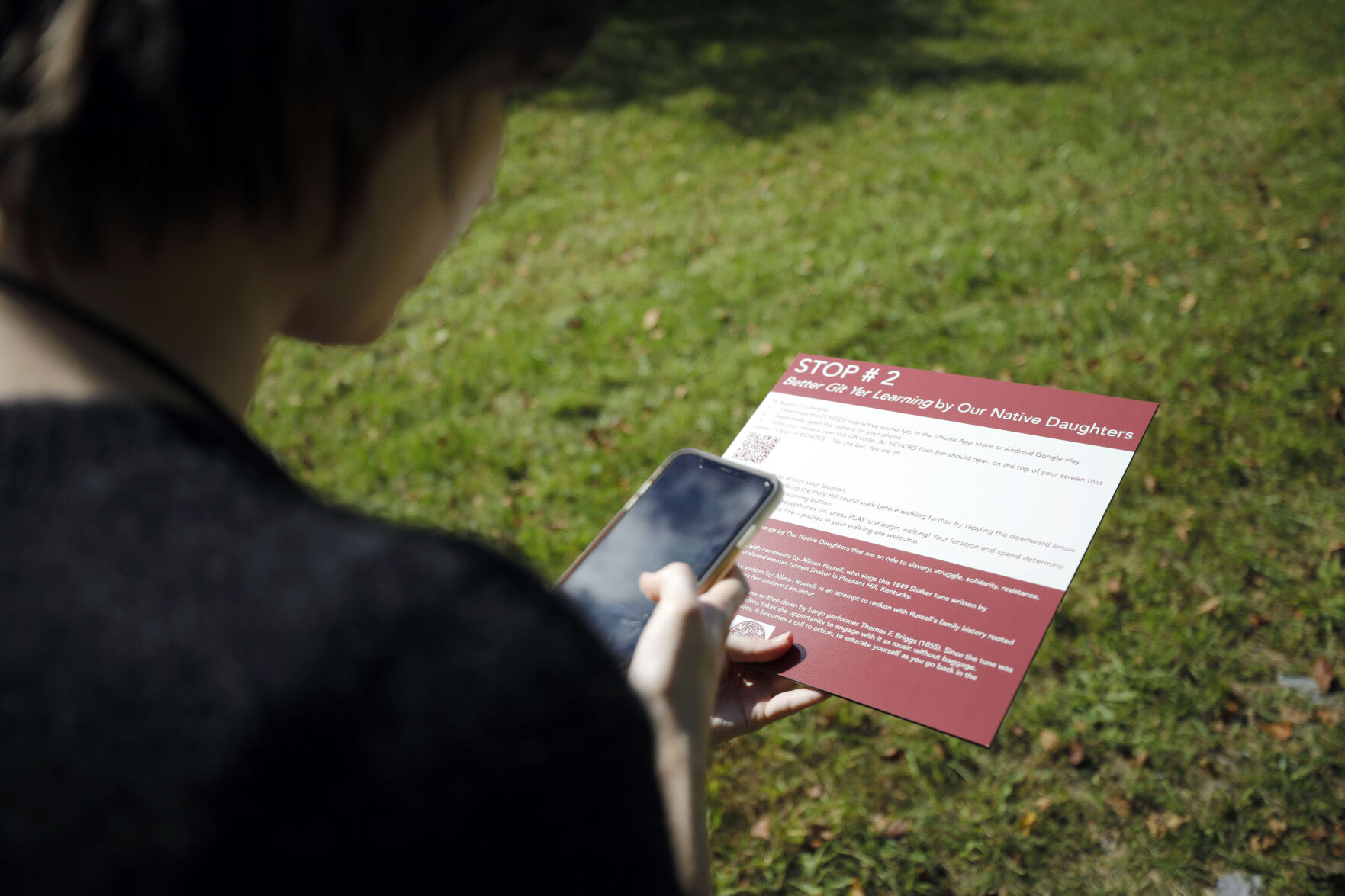 Annie Abernathy scans sign with phone